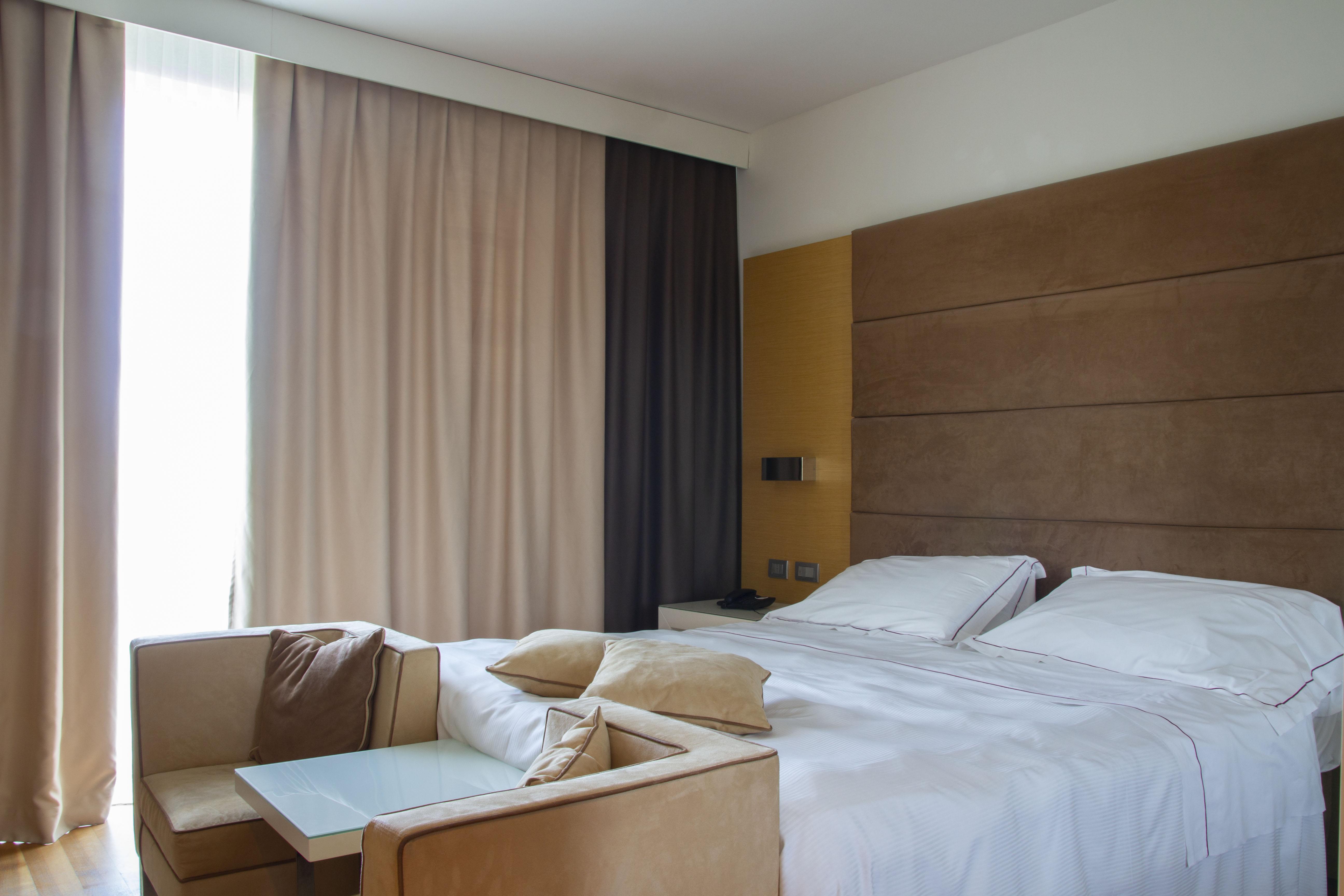 Отель Pisa Tower Plaza Экстерьер фото A bedroom